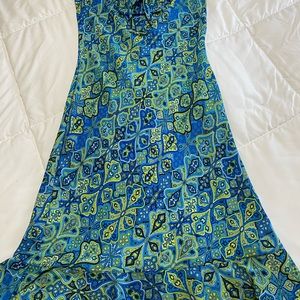 Summer spaghetti strap dress.  Lightweight fabric with cool color prints.